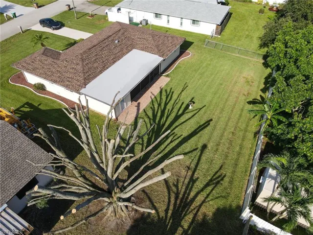 View of property location featuring nearby suburban area and a large body of water