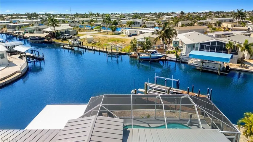 View of dock featuring glass enclosure