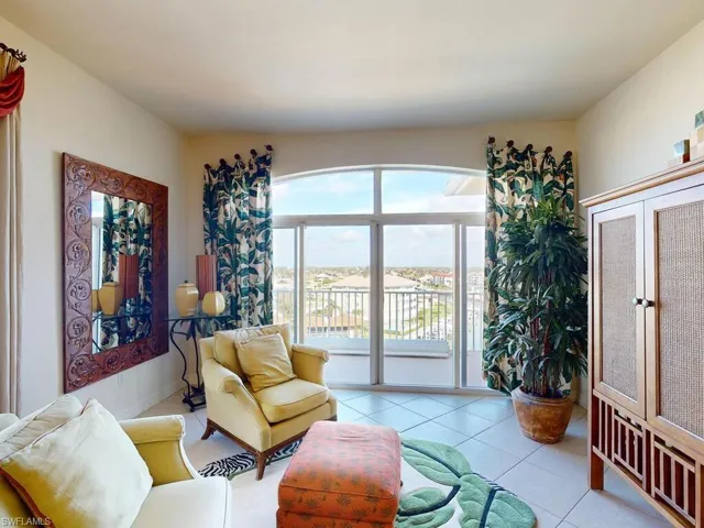 Sitting room featuring light tile patterned floors