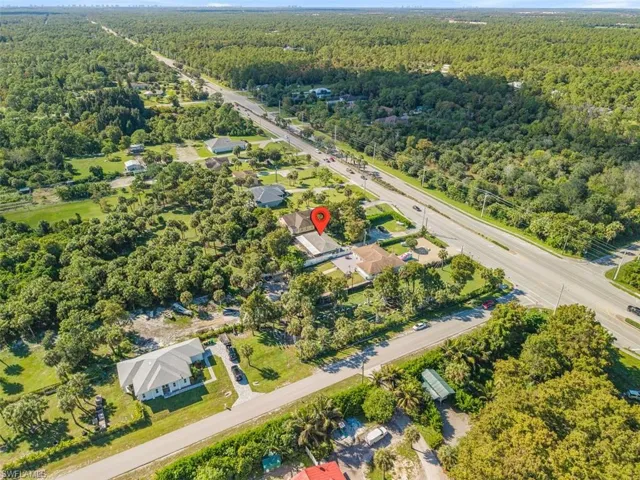 Aerial overview of property's location with a forest