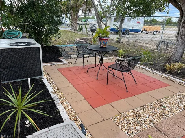 View of patio featuring central AC