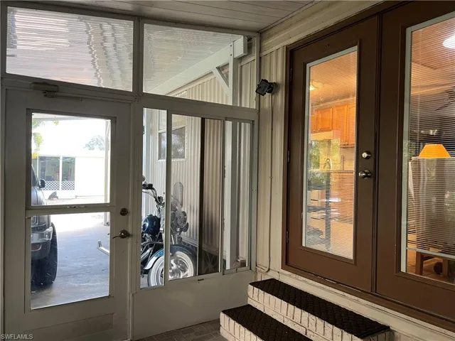 Doorway featuring french doors