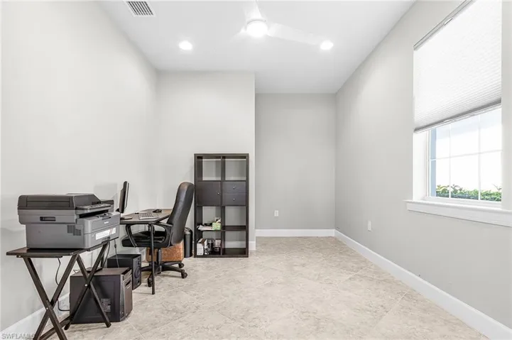 Office area featuring recessed lighting and ceiling fan