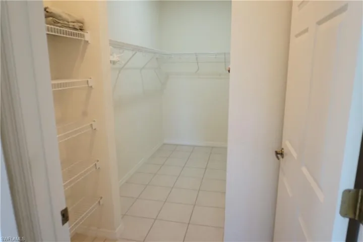 Huge walk-in closet in primary bedroom