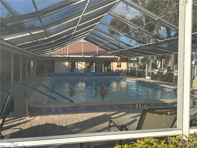 Community pool with glass enclosure