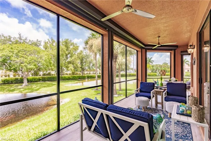 Sunroom featuring a healthy amount of sunlight and ceiling fan