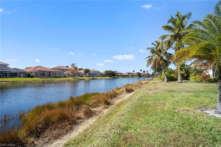 Water view with nearby suburban area