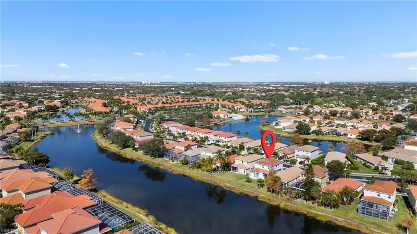 Aerial view of residential area with a nearby body of water
