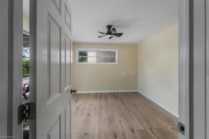 Spare room with light wood-type flooring