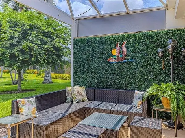 View of patio / terrace featuring an outdoor hangout area and a sunroom