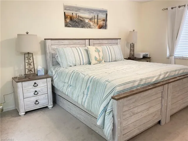 Primary Bedroom with King bed and twin trundles underneath