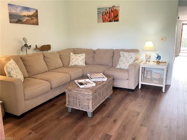 Living area overlooks golf course / there is a TV in the living area