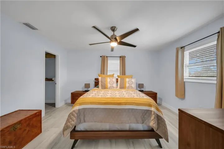Light-toned wood-finish flooring throughout
