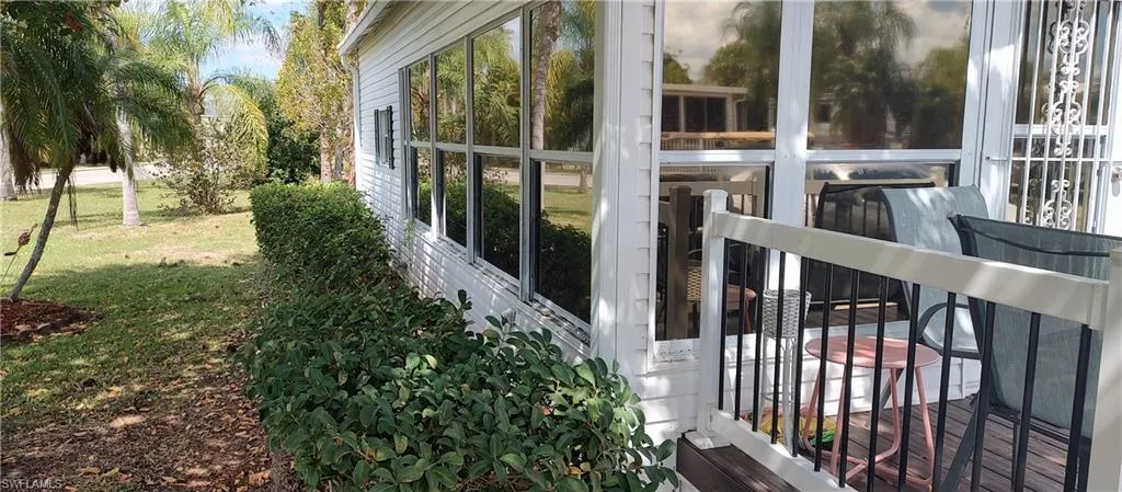 View of home's exterior with a lawn