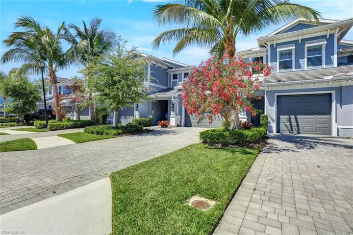 Living room featuring ceiling fan with notable chandelier, light wood-type flooring, visible vents, recessed lighting, and baseboards