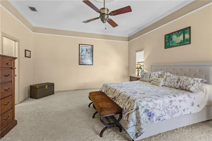 Huge main Bedroom with carpet