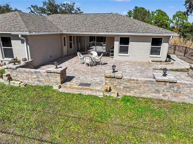 This backyard was built for entertaining & enjoying all that our SWFL weather has to offer!
