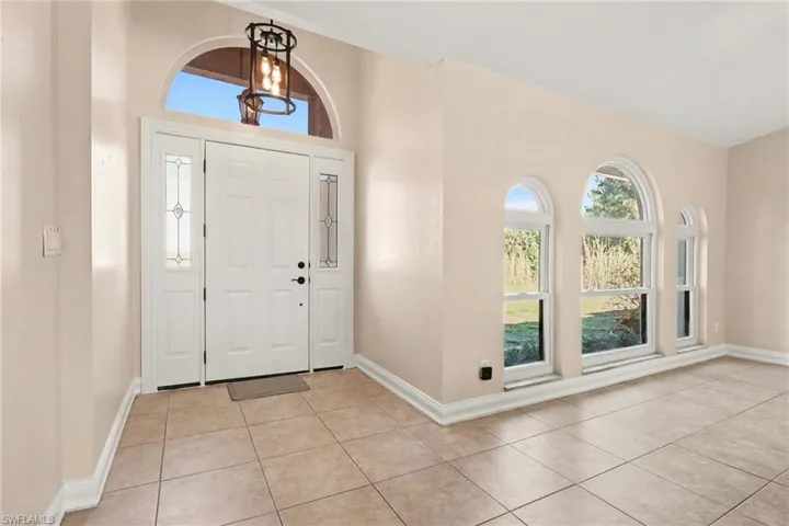 Newly replaced front door entryway in August 2025
