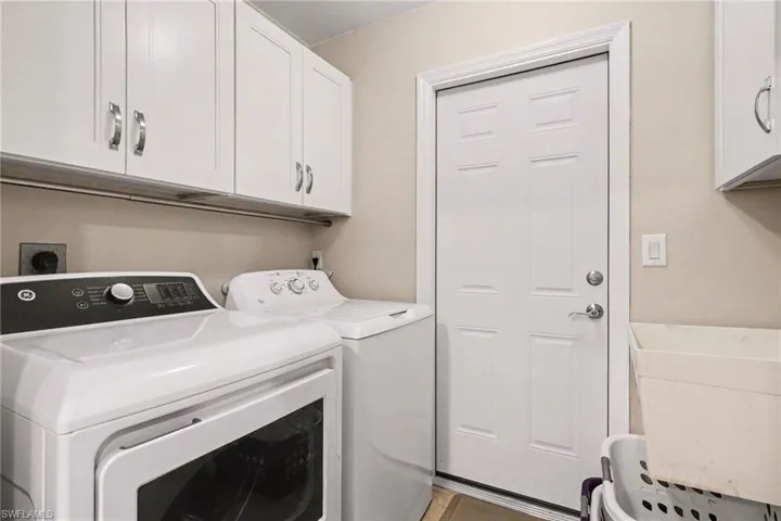 Extra storage and a laundry tub. Conveniently next to the garage entry & kitchen