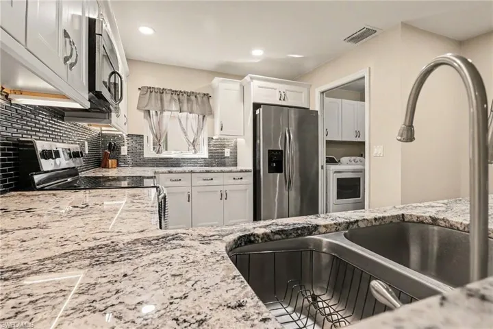 A double sink with a disposal