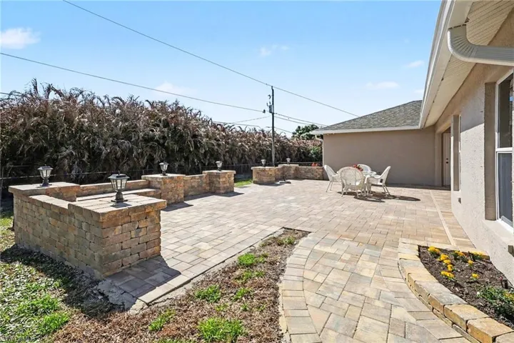 The intricate winding pathway will lead you back to the front yard