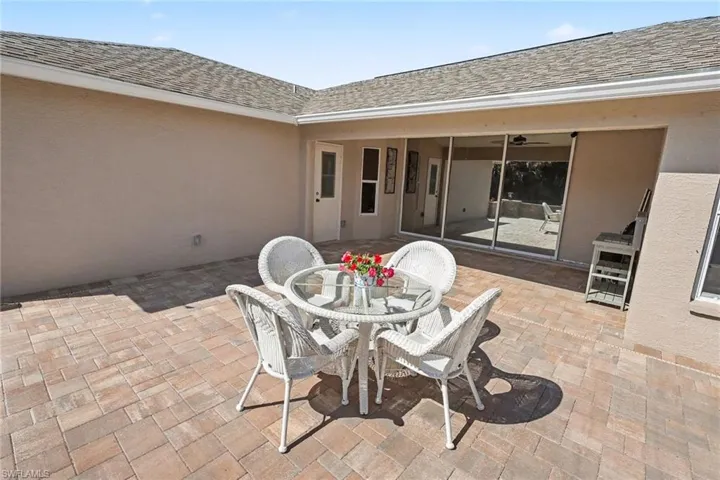 The extensive patio has a nice section under roof also