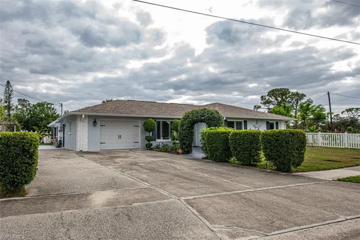 Ranch-style home featuring a garage