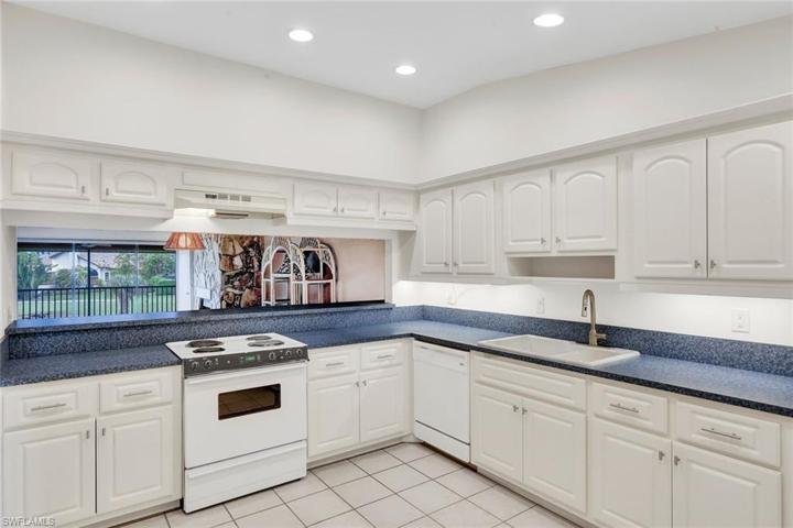 Appliances Stay, Tile Floor, Formica Counter Tops