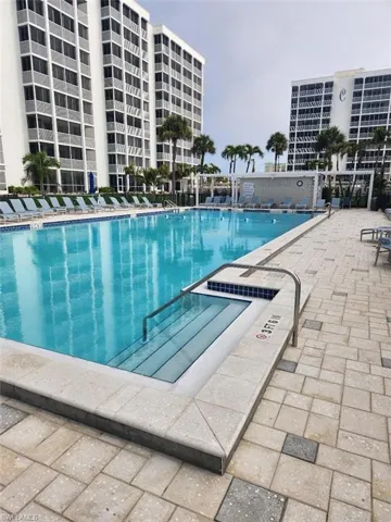 Community pool with a patio area