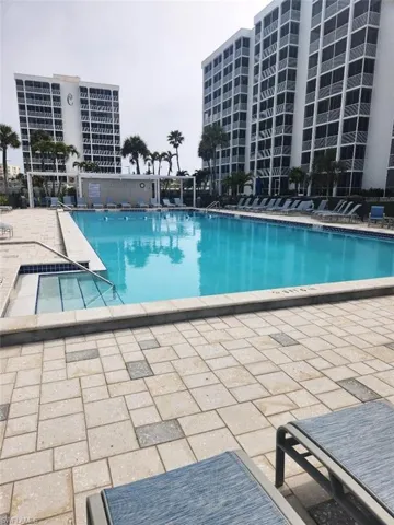 Community pool featuring a patio area