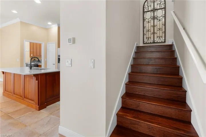 Wood stairway leading to second floor.