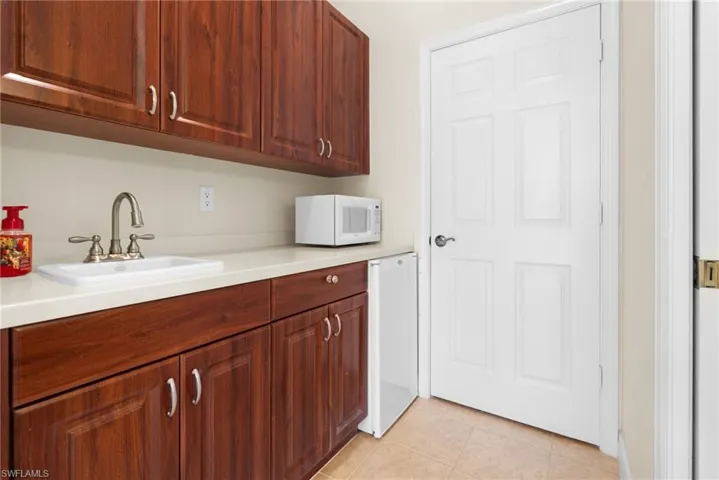 Cabana Kitchenette with sink, microwave & refrigerator.