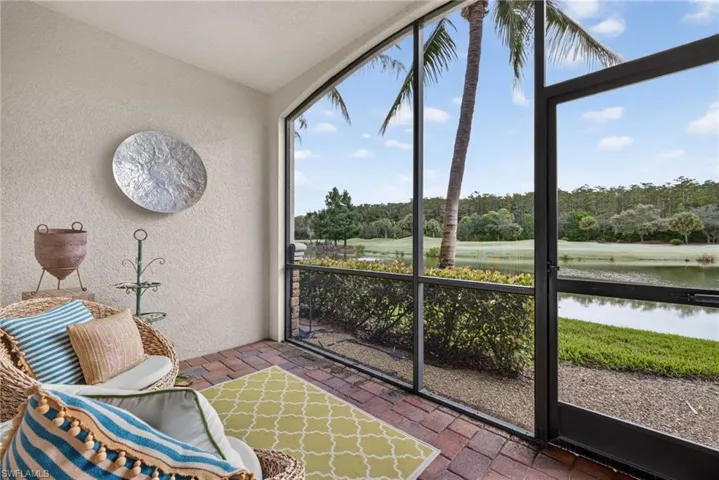 Rear Eastern Exposure Screened-In Lanai with Lake, Golf Course, and Preserve Views