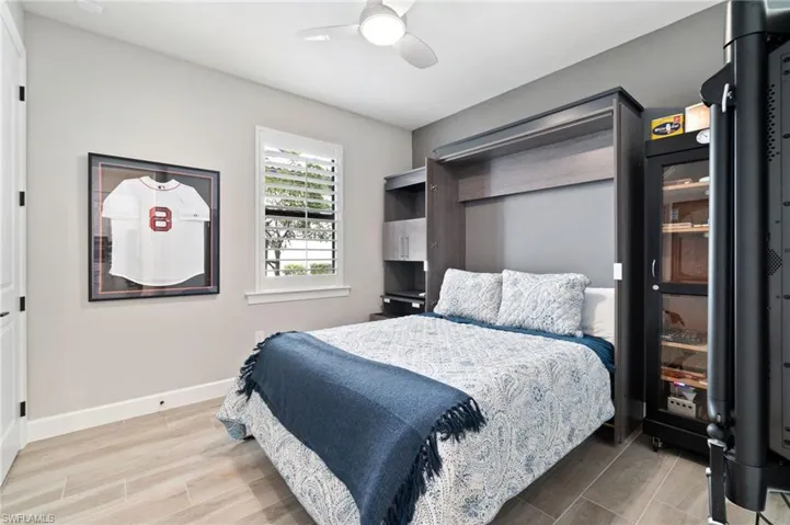 A convenient Murphy bed is featured in the third bedroom, maximizing space and functionality
