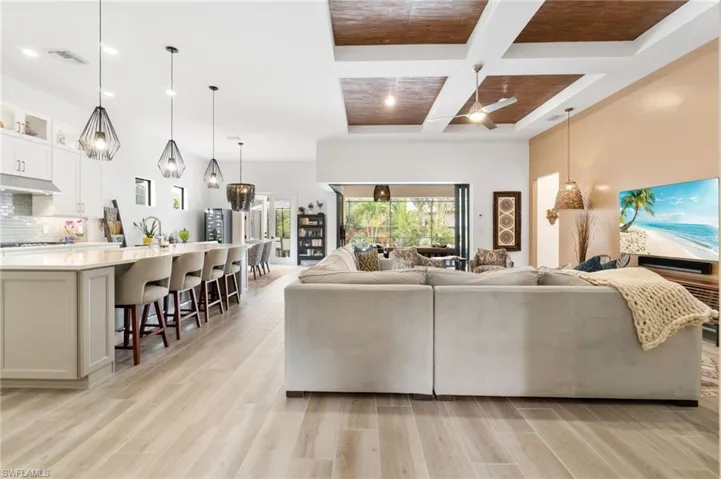 The main living areas are filled with warmth and an abundance of natural light