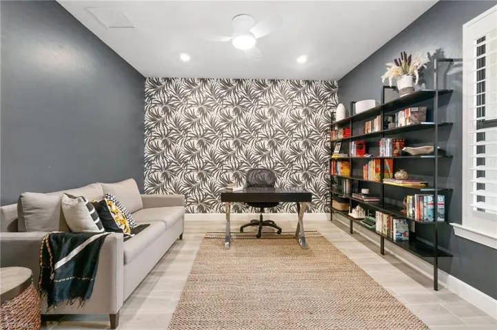 Beautiful office/den with custom wallpaper