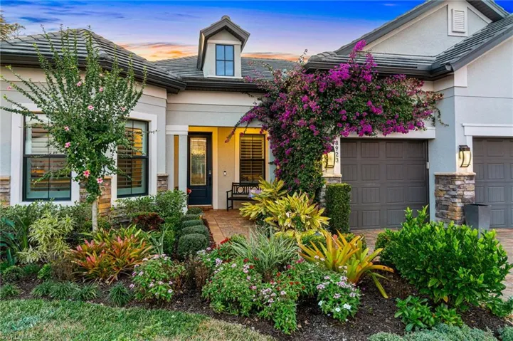 View of front of property featuring a 3 car garage
