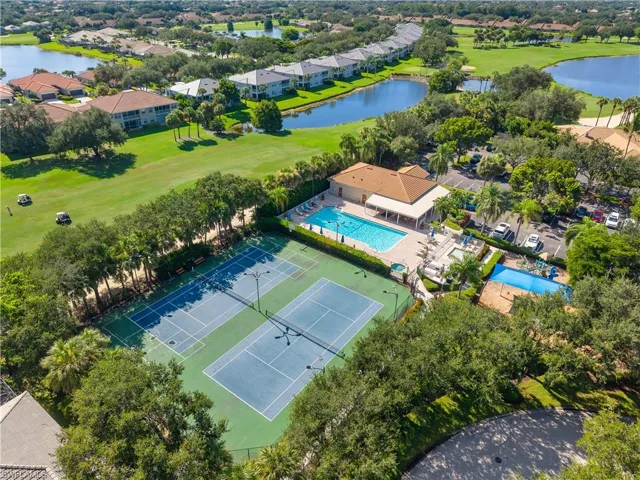 Aerial view of a golf course and a large body of water