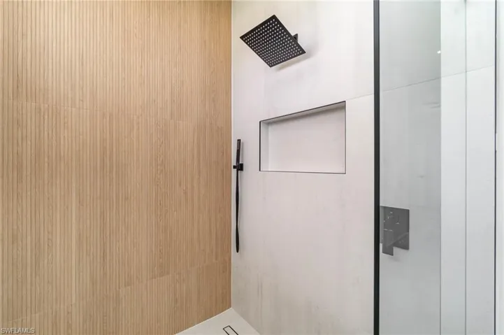 Bathroom with a tile shower