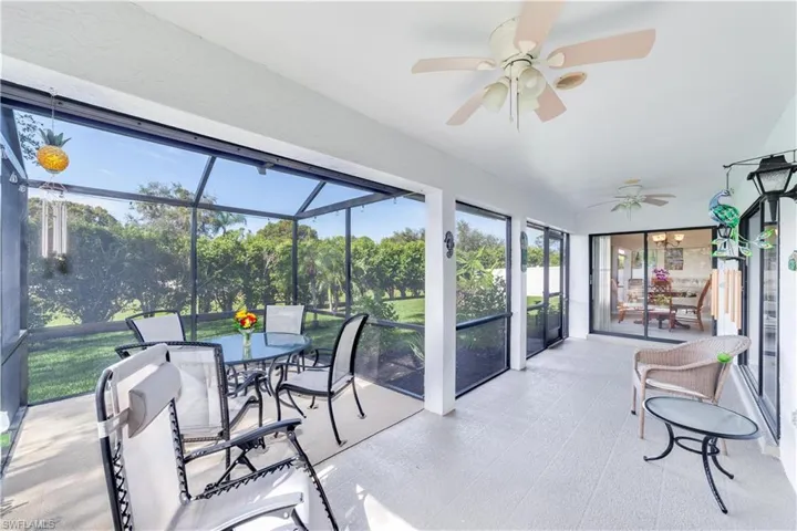 Lanai with a ceiling fan, outdoor dining area, plenty of natural light, and a patio
