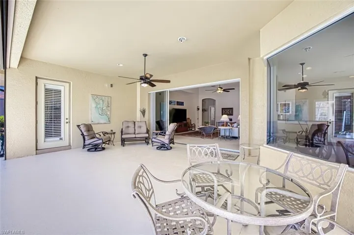 View of patio featuring ceiling fan