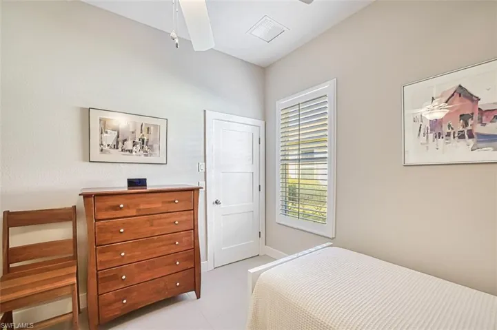 Bedroom featuring ceiling fan