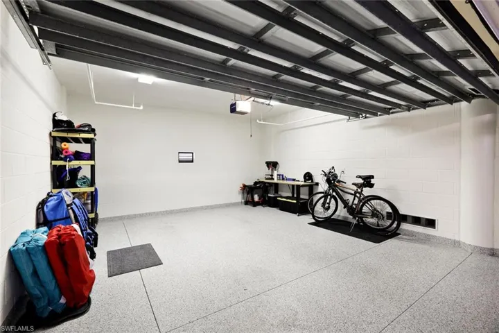 Private 2 car garage for the unit with epoxy flooring - NOT EVERY UNIT HAS AN ENCLOSED GARAGE - Owner had flooring done.