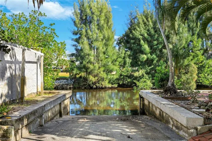 This home offer a private boat ramp.