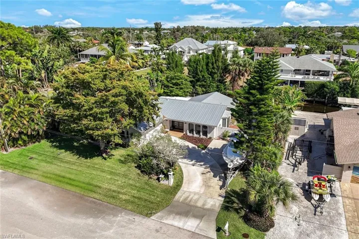 This home is adorned with lush landscaping.