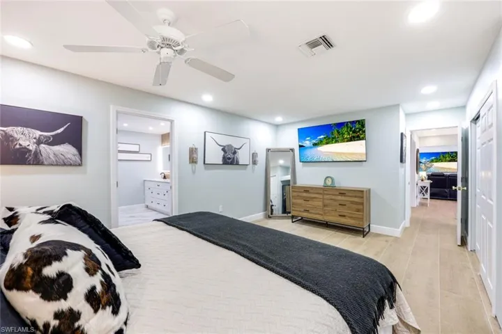 The primary bedroom is privately tucked away from the main living area.