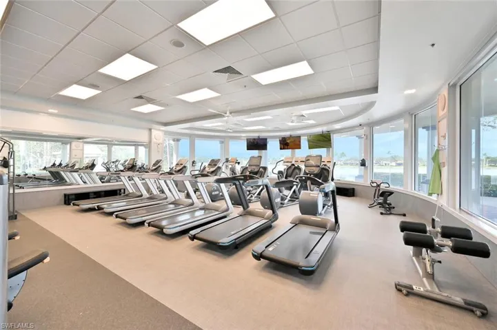 Workout area featuring a paneled ceiling