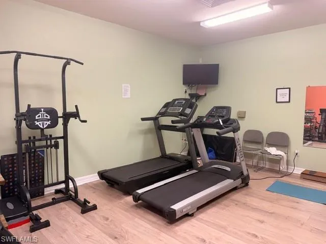 Well-equipped community fitness center — residents enjoy on-site exercise facilities at Van Loon Commons