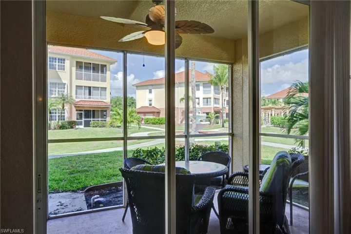 Screened lanai with ceiling fan — indoor-outdoor living year-round