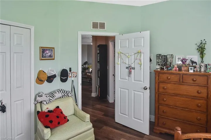Living area with dark wood-style flooring